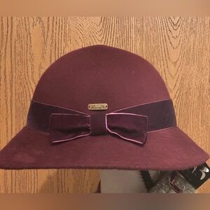 Adora wool felt cloche hat. The hat is a deep burgundy color NWT